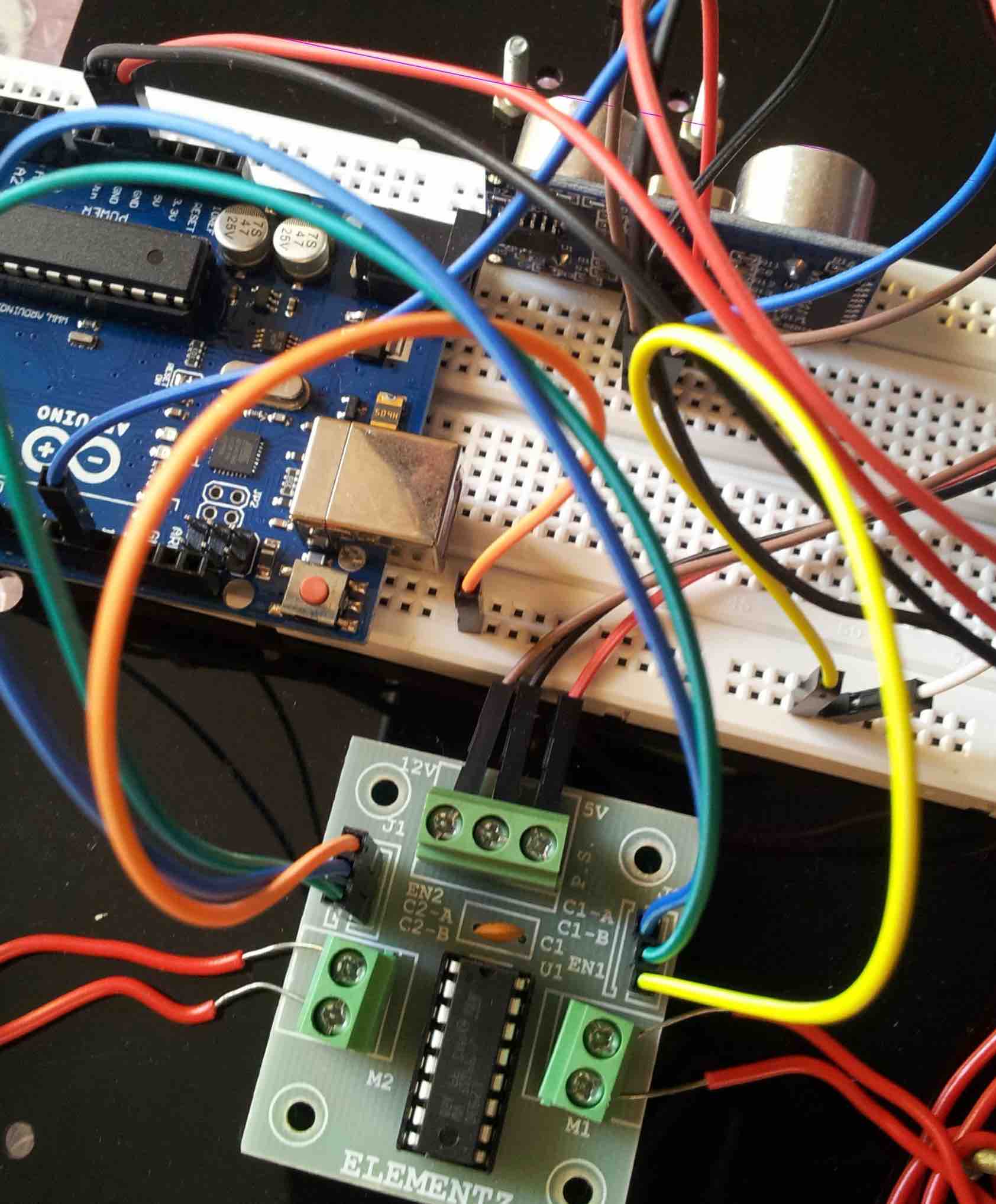 Obstacle avoiding robot using hot sale l293d